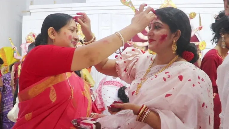 Women in Naogaon Celebrate Bijoya Dashami with Traditional ‘Sindoor Khela’
