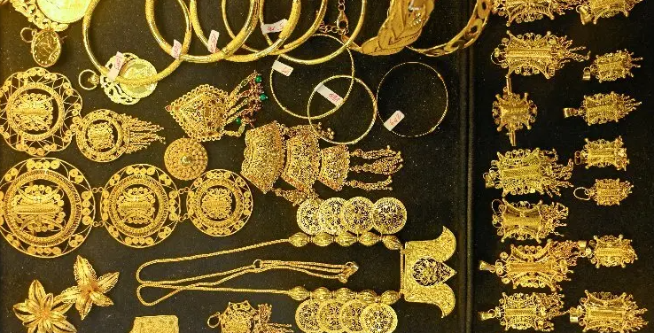 Gold Prices Plummet in Global Market; Bangladesh Adjusts Domestic Rates